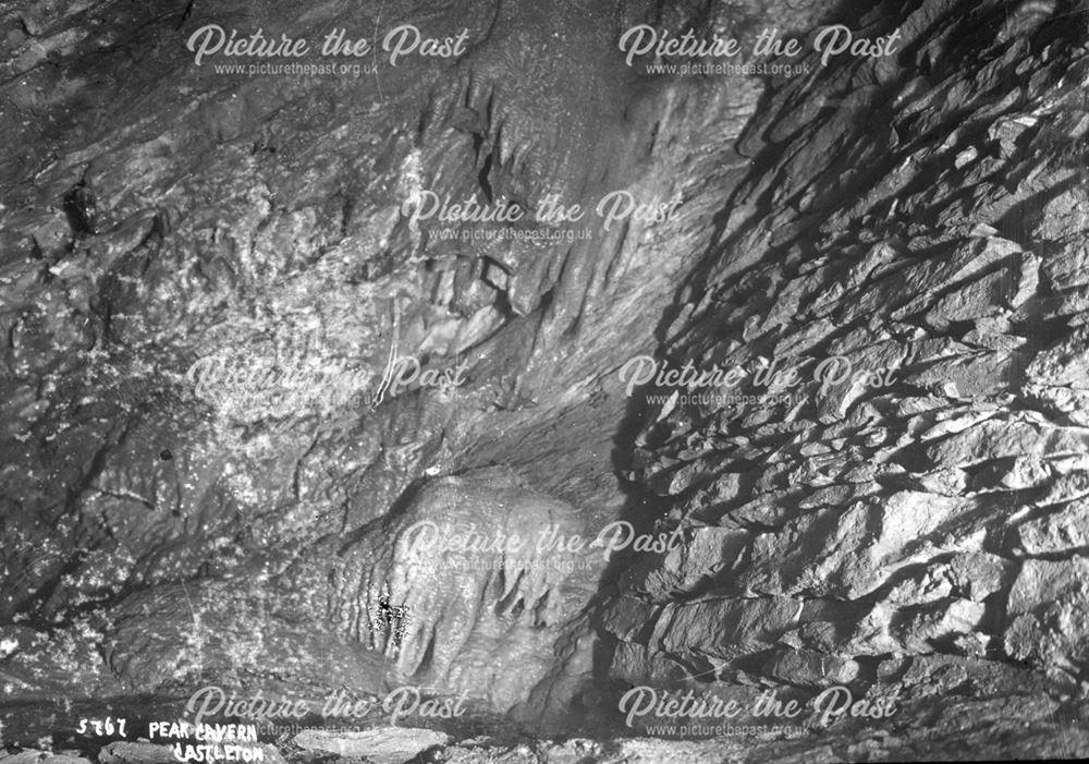 Exploring underground, cavers in action, c 1900