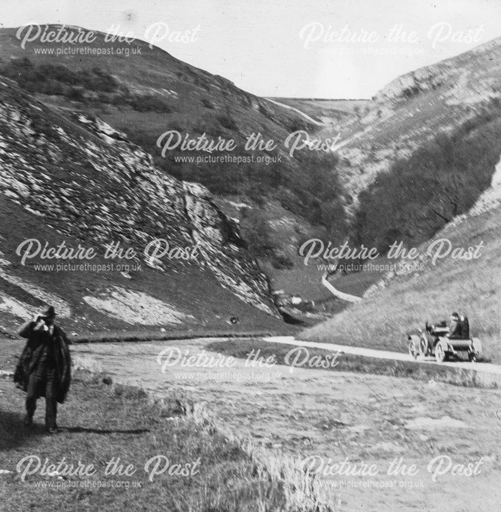 Car ascending limestone dale beside river