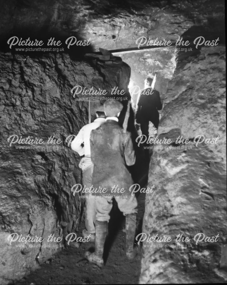 Early cave explorers in a lead mine, c 1900