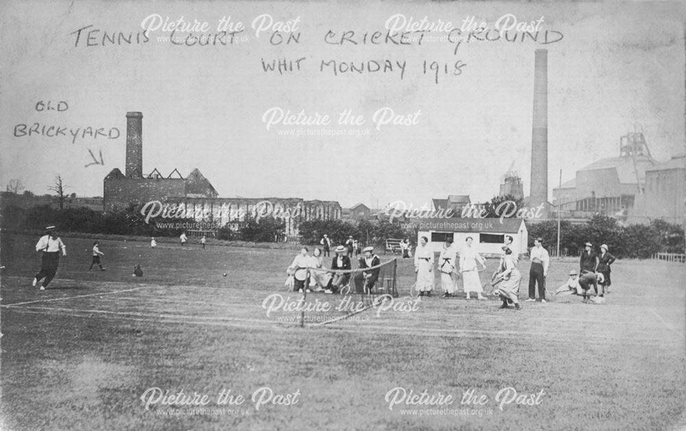 A Tennis Match being played on Holmewood Cricket Ground