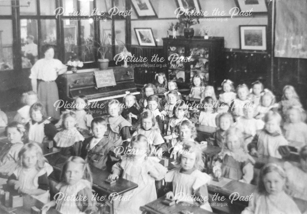 Dronfield Board School pupils and teacher in a classroom