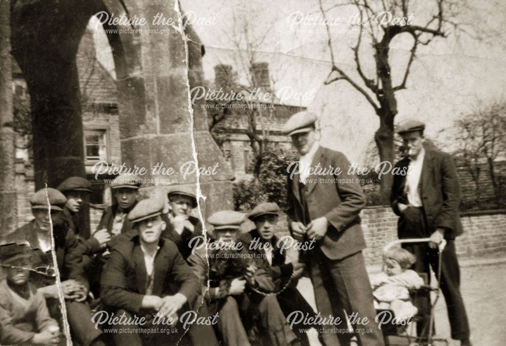 A group of Dronfield men in front of the Peel Monument