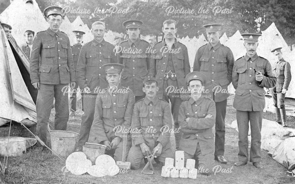 Group photograph of soldiers at an army camp