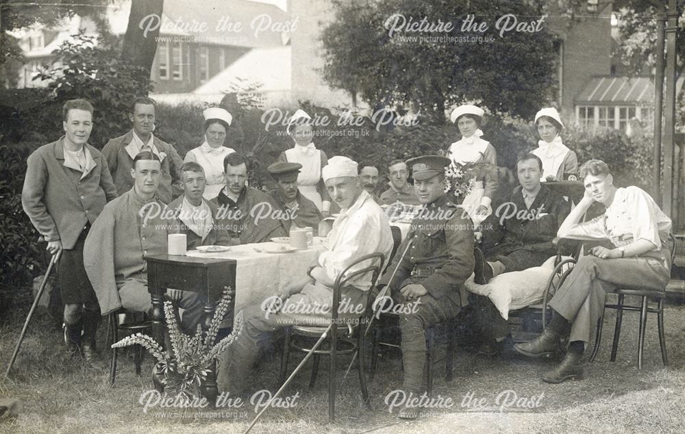 Wounded soldiers enjoying lunch in the grounds