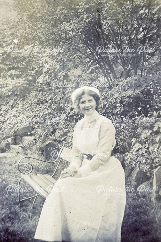 Nurse sitting in the grounds