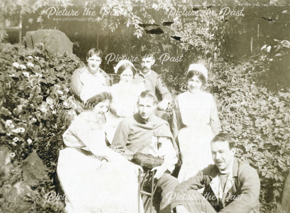 Wounded soldiers and nurses in the grounds