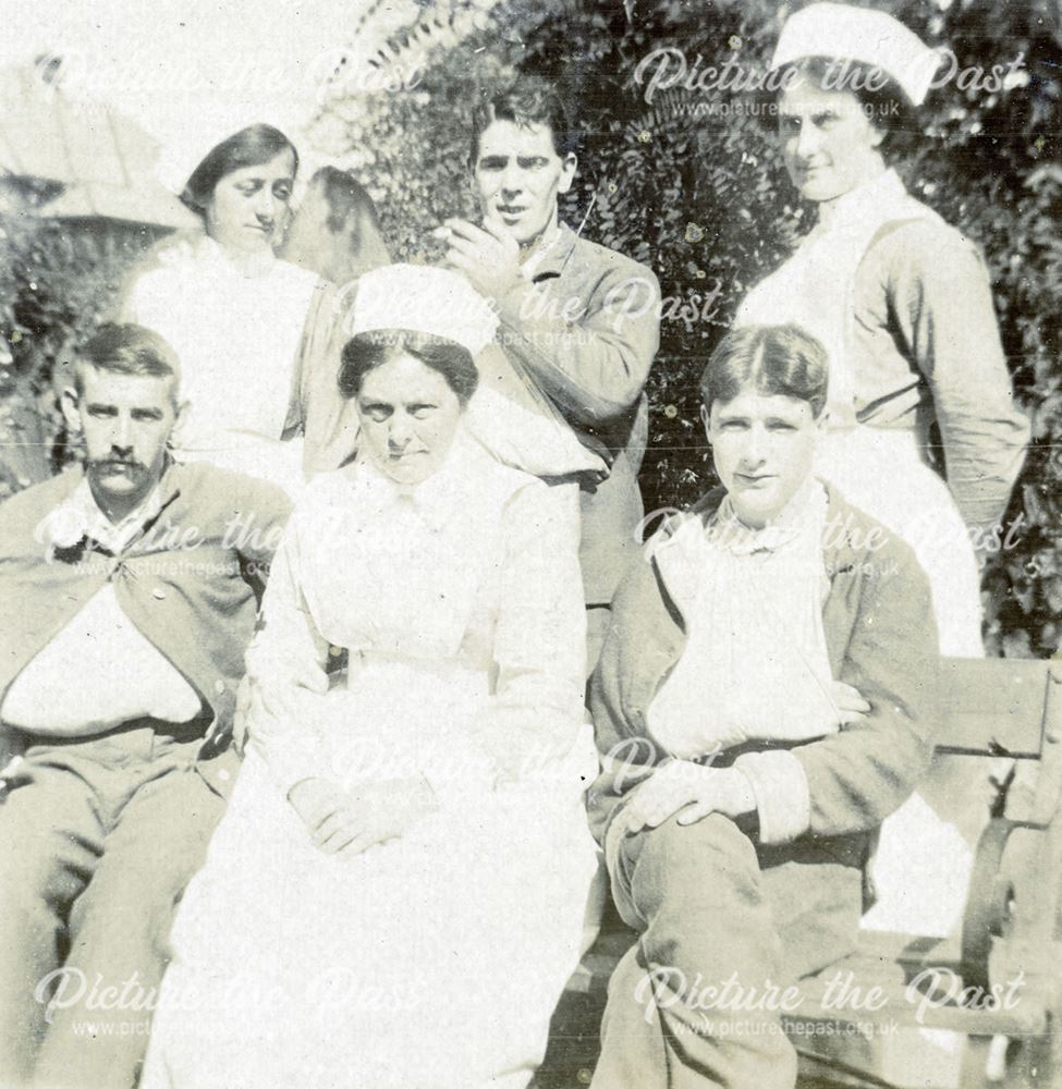 Wounded soldiers and nurses in the grounds