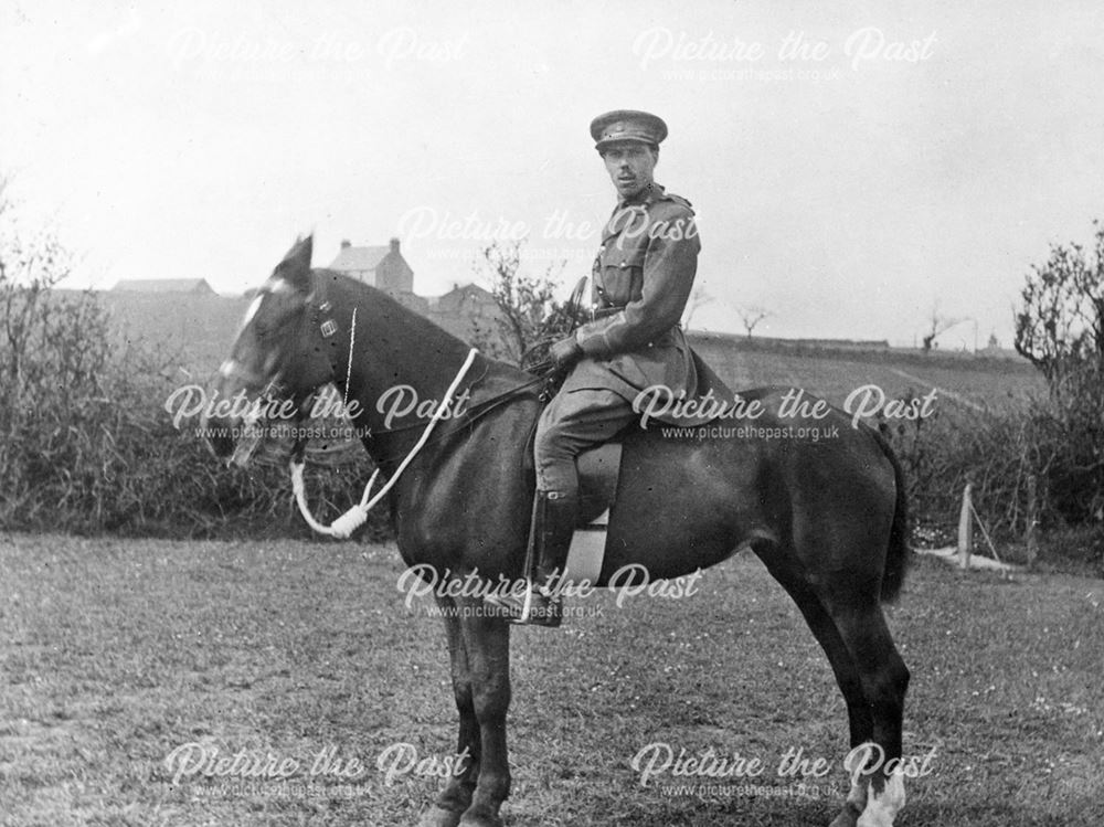 Charles Sisum Wright in military uniform on horseback