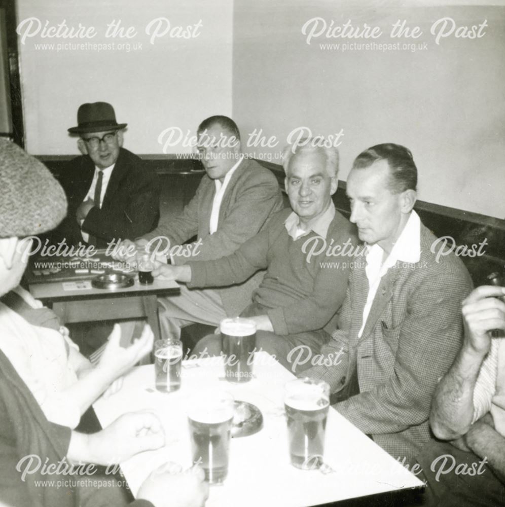 A pint and a game of dominoes in The Lamb Inn, Holymoorside, undated