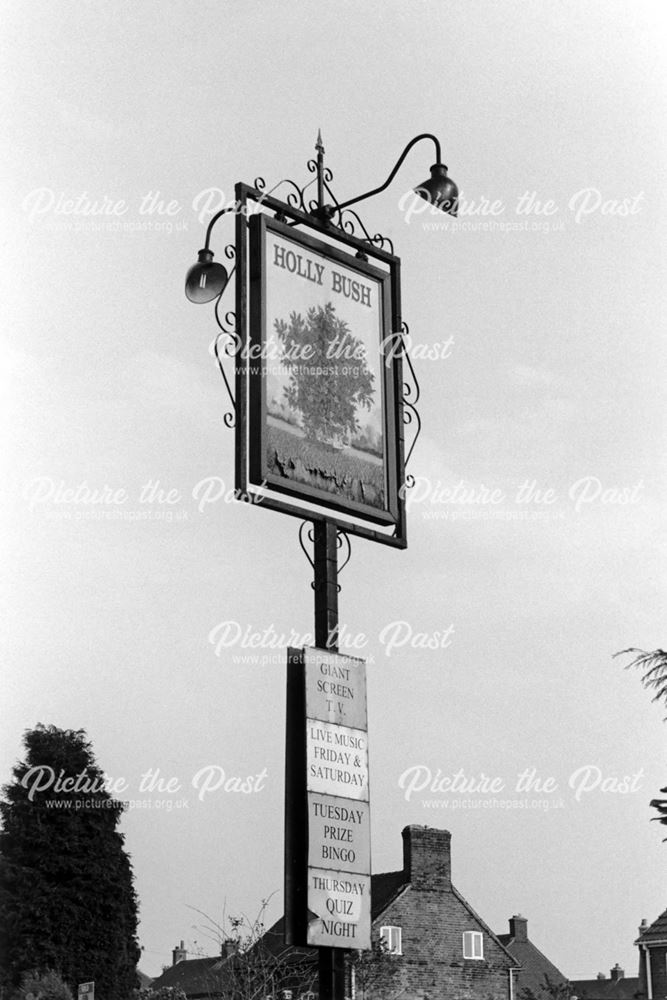 Holly Bush pub sign, corner of High Street and Warren Drive, Linton, 2002