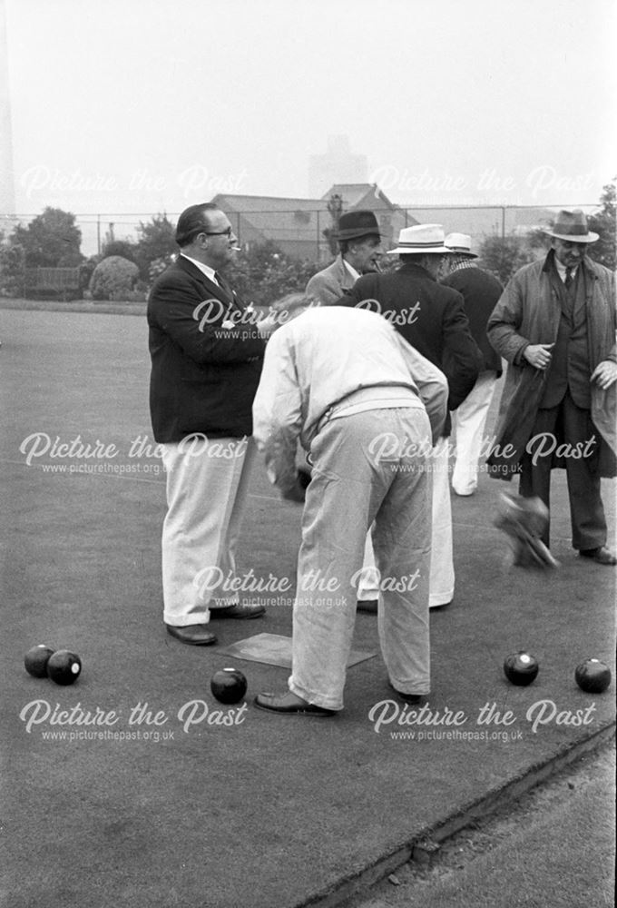 A game of Bowls at the company bowling green.