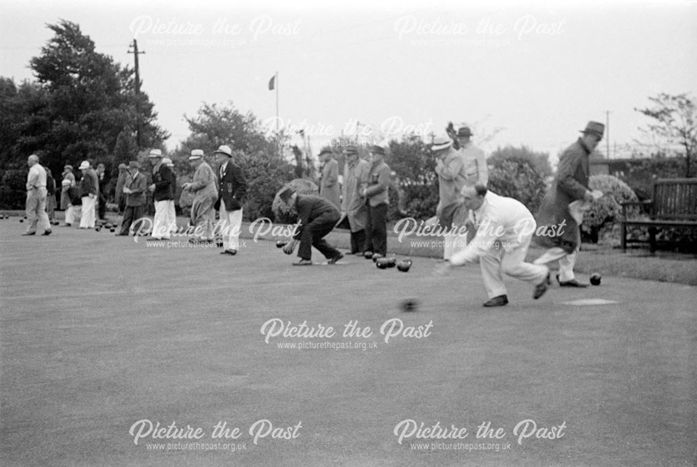 A game of Bowls at the company bowling green.