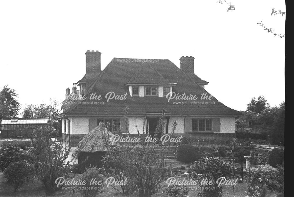 Photograph of a Stanton house with a garden (which overlooks the Nutbrook Valley and Stanton Works)