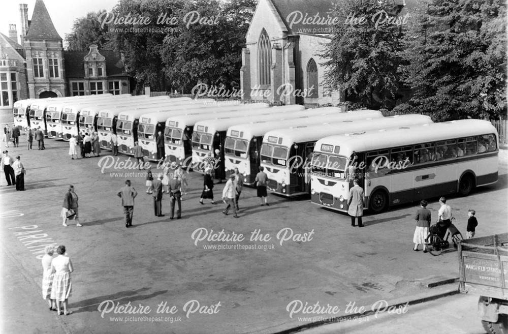 A line of 13 Midland General single deck Bristol coaches on a private outing