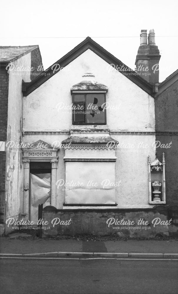 Intricate plasterwork on houses awaiting demolition