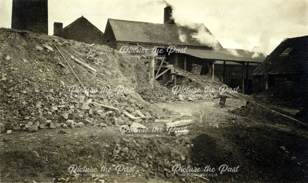 The 'old' grinding mill and clay dump at the brick and sanitary pipe works of W H and J Slater, Denb