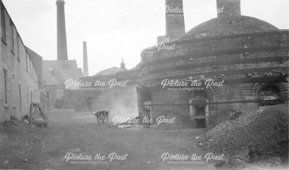 Round down-draught kilns at the brick and sanitary pipe works of W H and J Slater, Denby