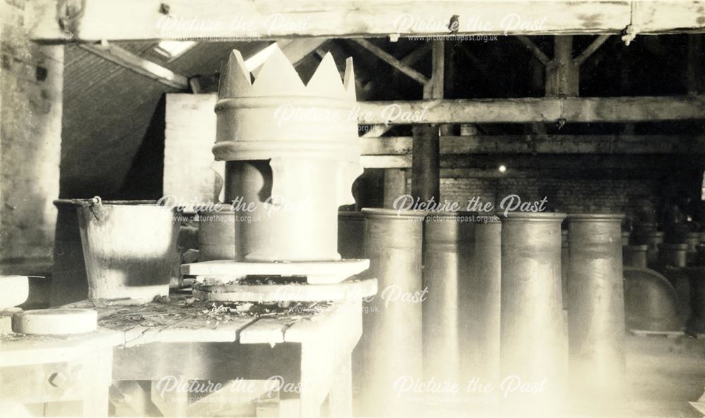 Interior of the workshops, chimney pots, at the brick and sanitary pipe works of W H and J Slater, D