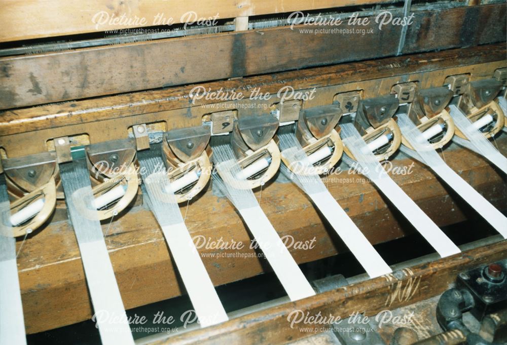 Close-up of a Multi-shuttle Loom at Lilley's Narrow Fabrics, Washington Mill, Borrowash