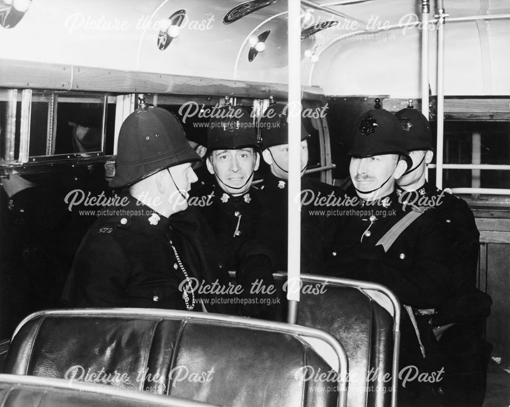 Policemen on board a Derby Corporation bus