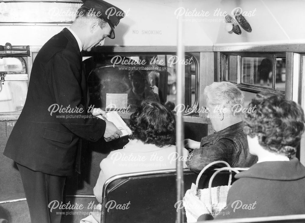 Inspecting tickets on a Derby Corporation bus