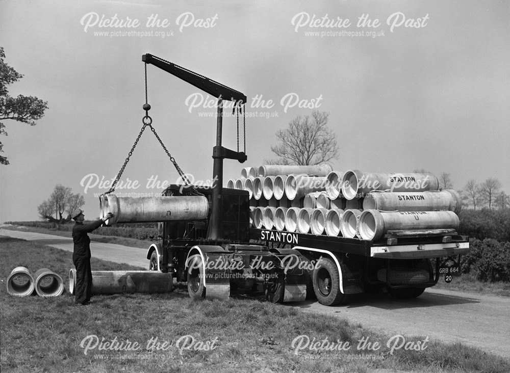 Matador Lorry carrying concrete pipes, Stanton Works