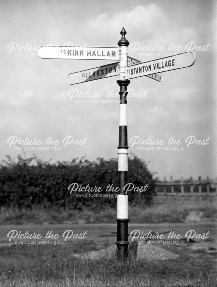 Cast Iron signpost