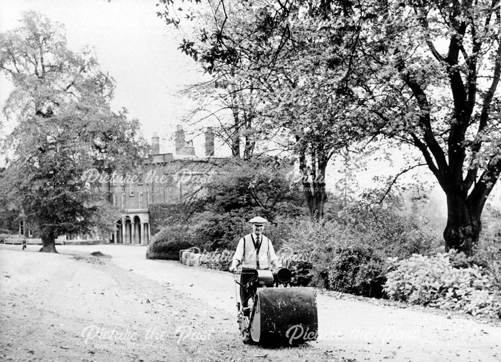 Mowing the grass in Darley Park.