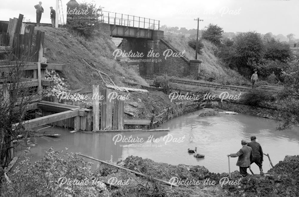 Construction of a new culvert through railway embankment for the diversion of the Nut Brook