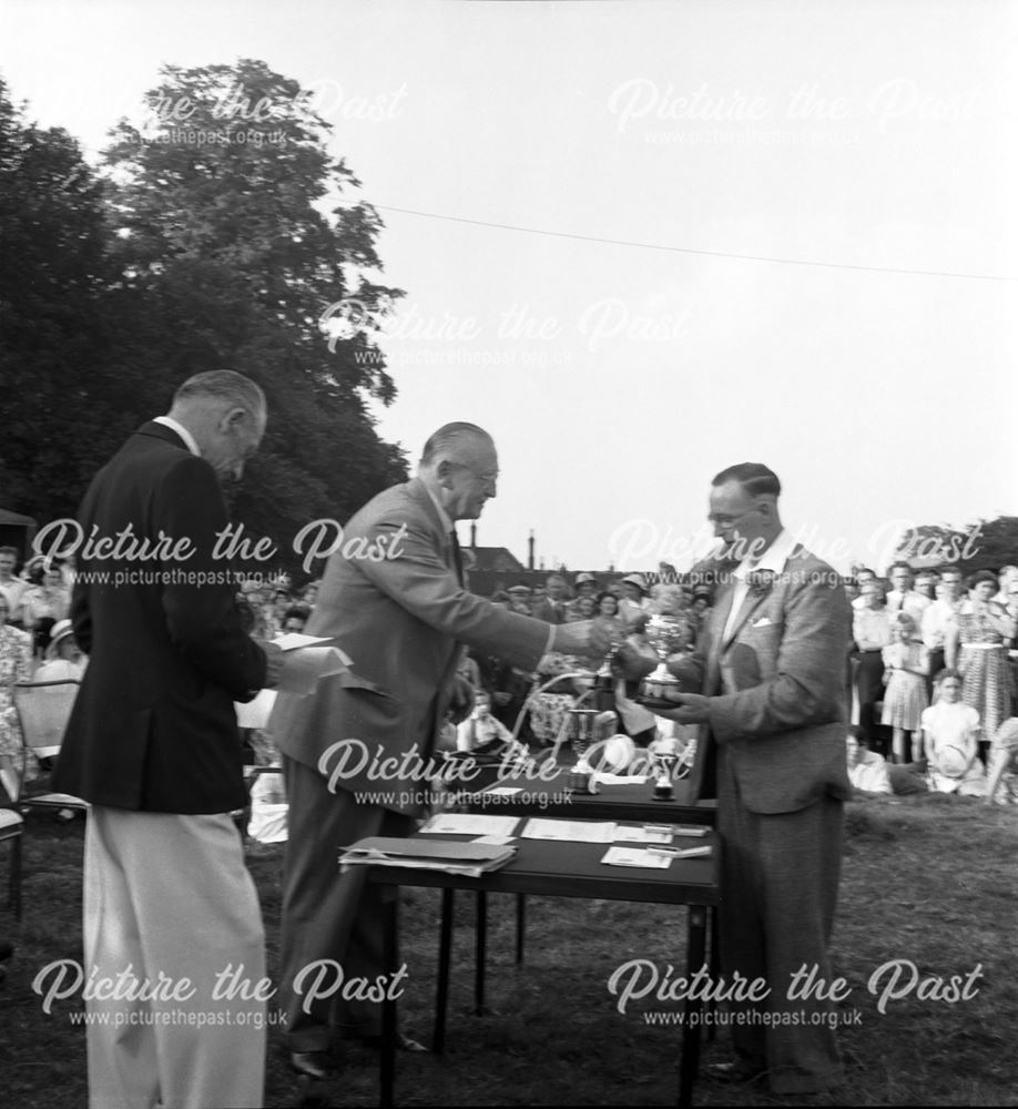 Sir Frederick Scopes presents awards at a Stanton Works Annual Flower Show