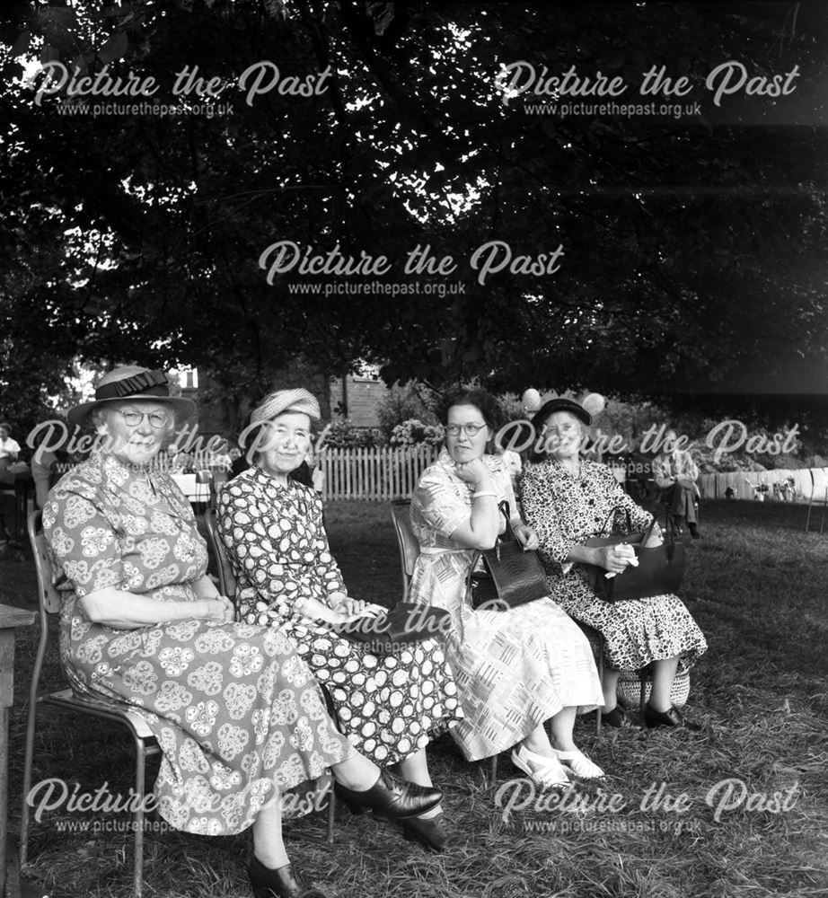 Four ladies at a Stanton Works Annual Flower Show