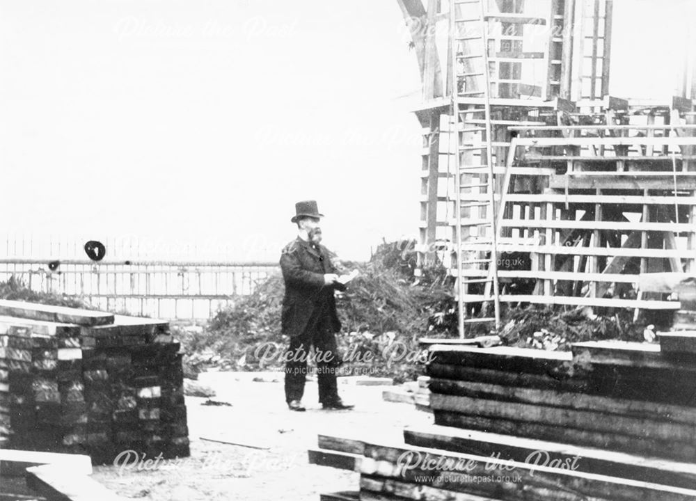 Construction of decorations outside the station for Queen Victoria's visit