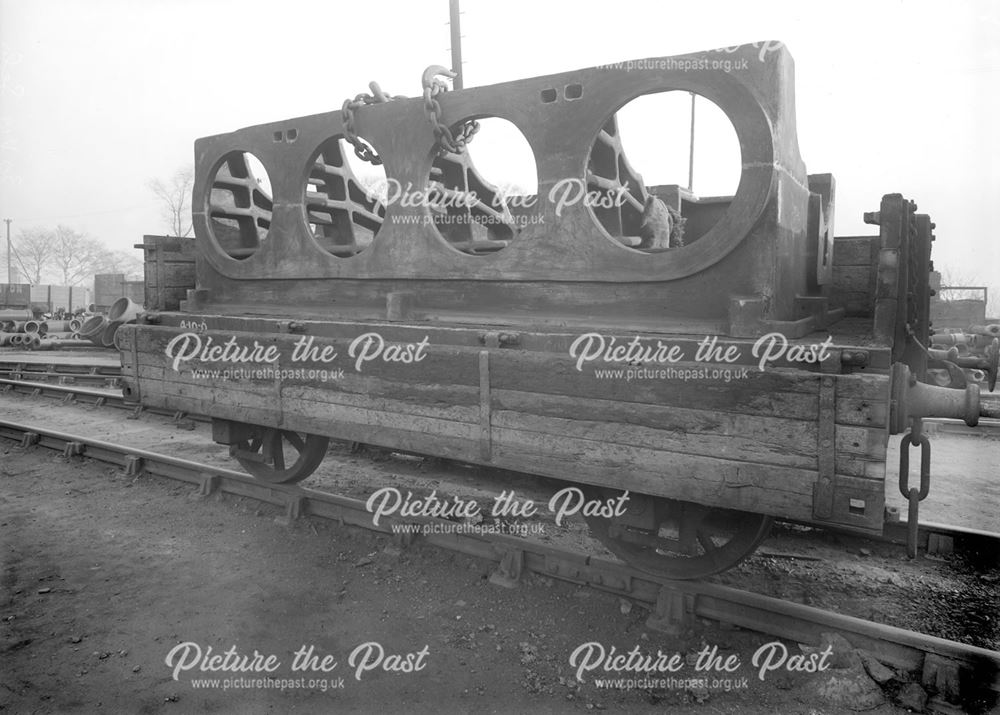 Gas engine bed loaded on a railway wagon