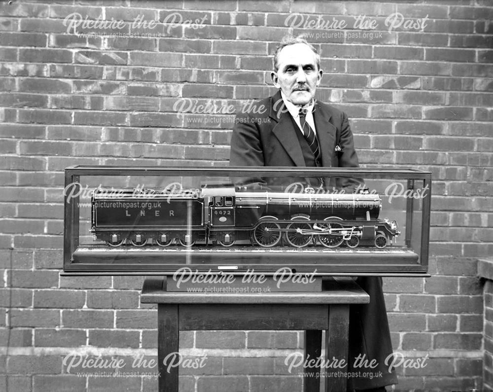 Louis Shaw with model steam locomotive