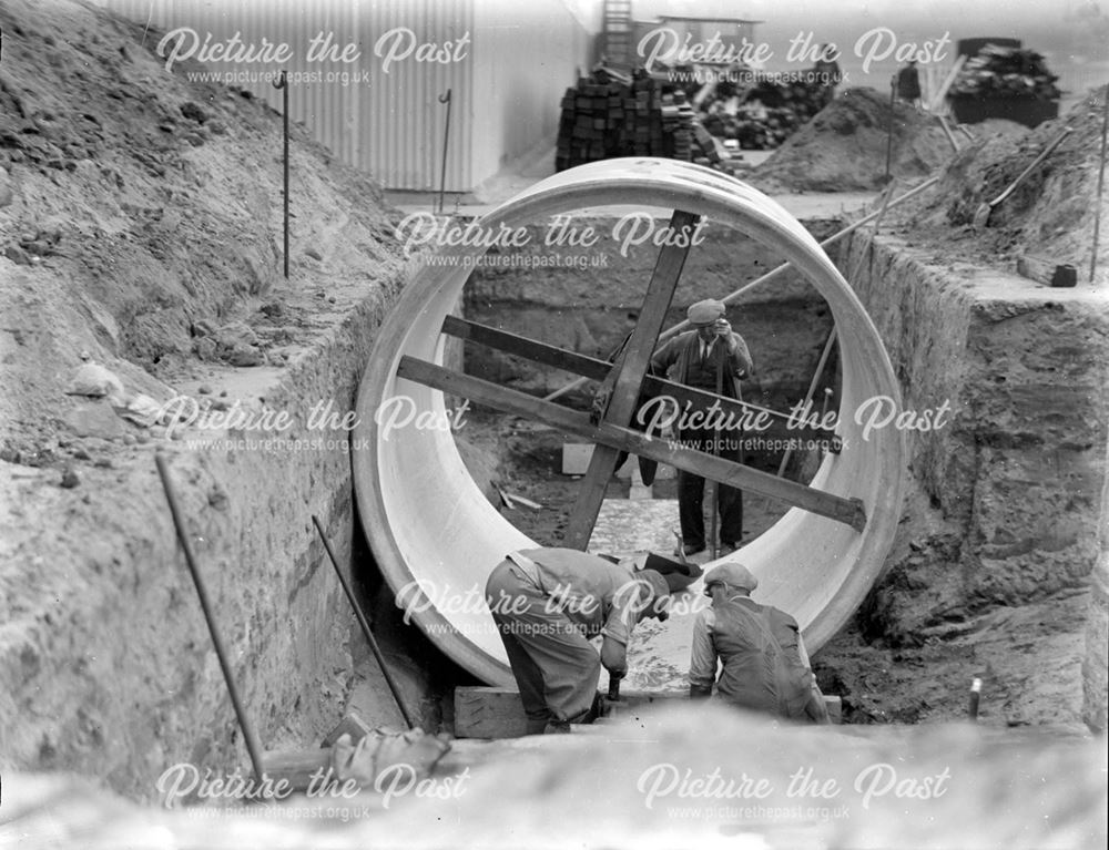 Constructing an air raid shelter using large diameter concrete pipes