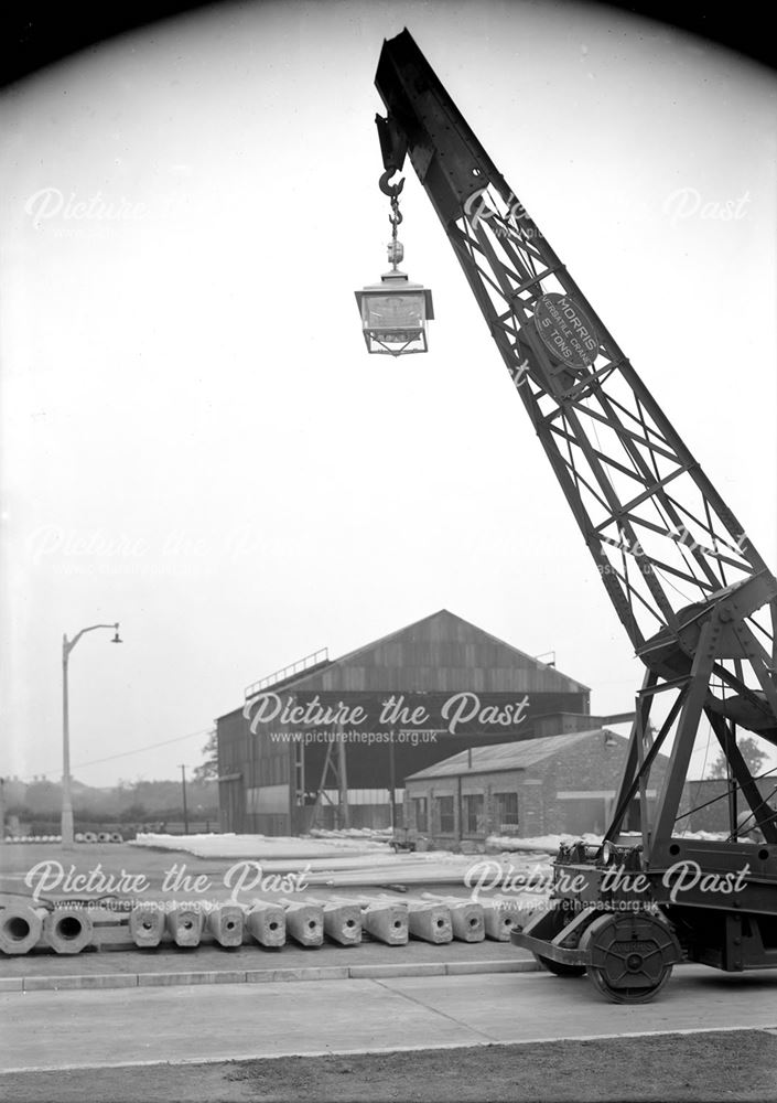 Crane lifting a lantern