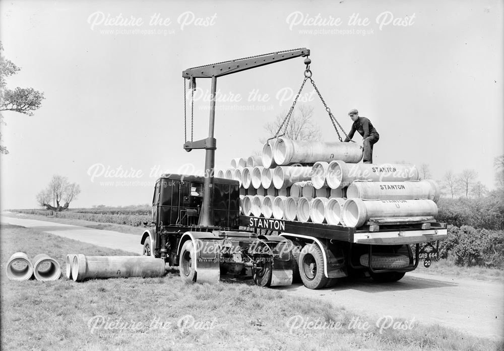 Stanton Ironworks Company Matador Carrimore lorry unloading concrete pipes, 1940