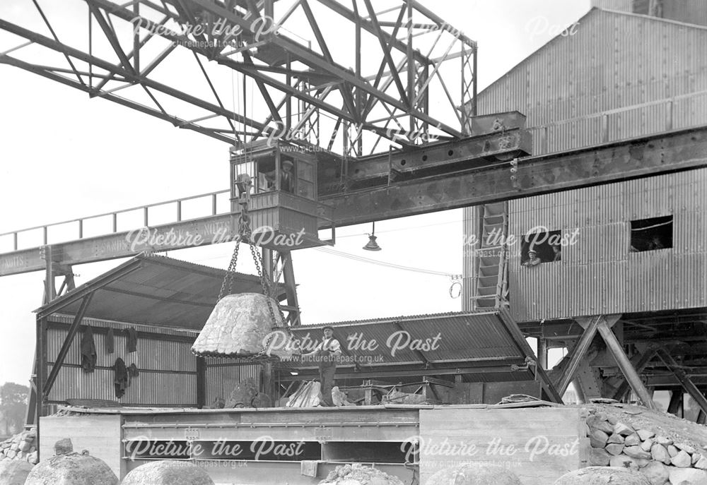 Slag ball being lifted into the Cracker at the Crushing Plant, 1930