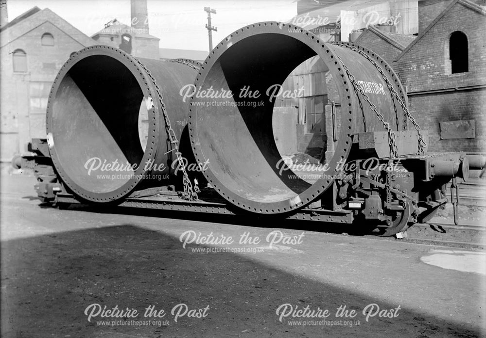 Two 9ft diameter cylinders on a railway wagon