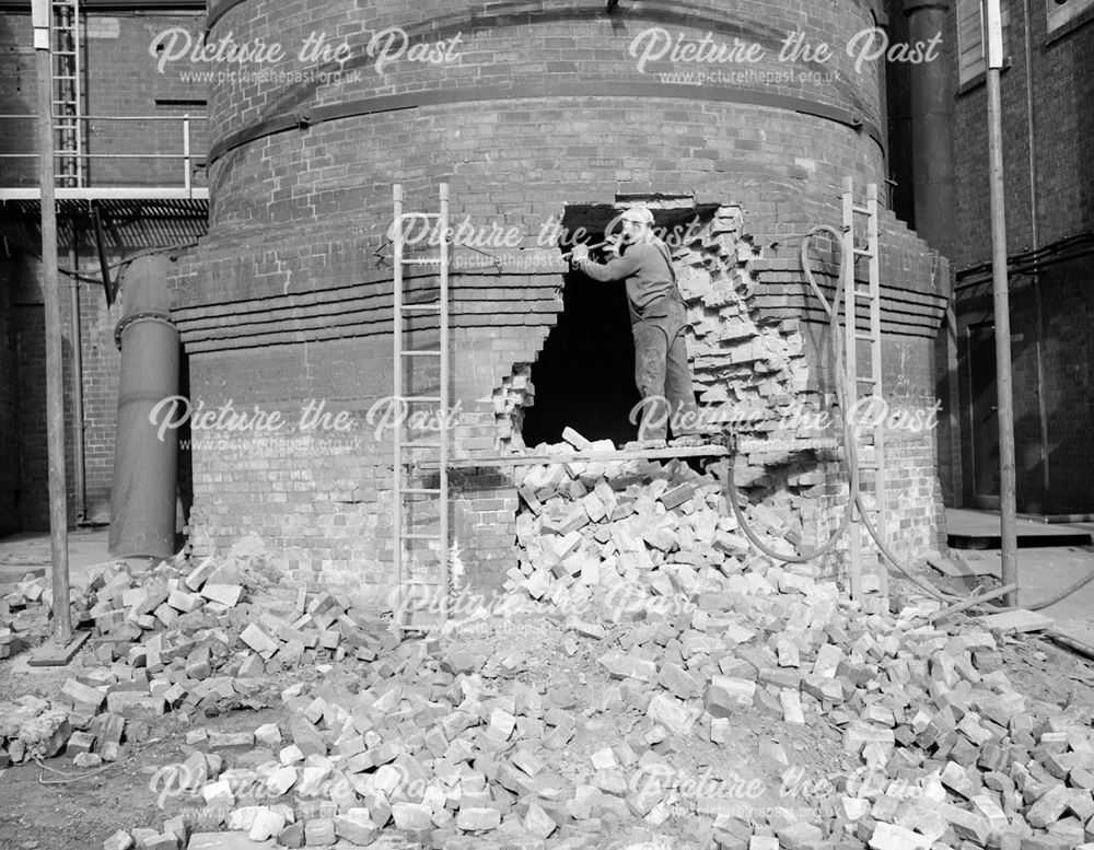 Demolishing chimney at New Works furnaces.