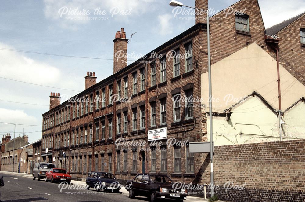 View of the facade of Longdon's Mill, looking west