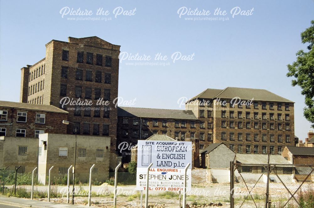 Factory buildings and vacant land around Rykneld Mills