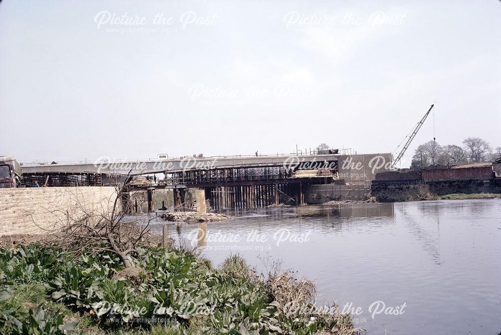 Construction of a new road bridge over the River Derwent, adjacent to the Old Cattle Market area