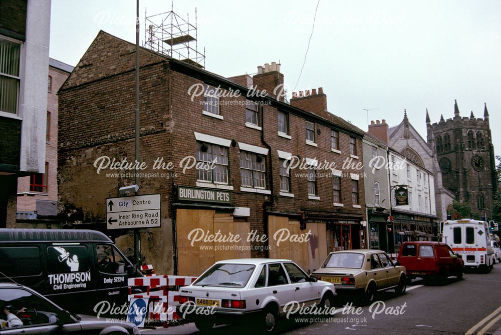 Georgian terrace of shops adjacent to The Buck in the Park public house