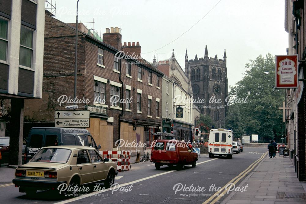 Georgian terrace of shops adjacent to The Buck in the Park public house