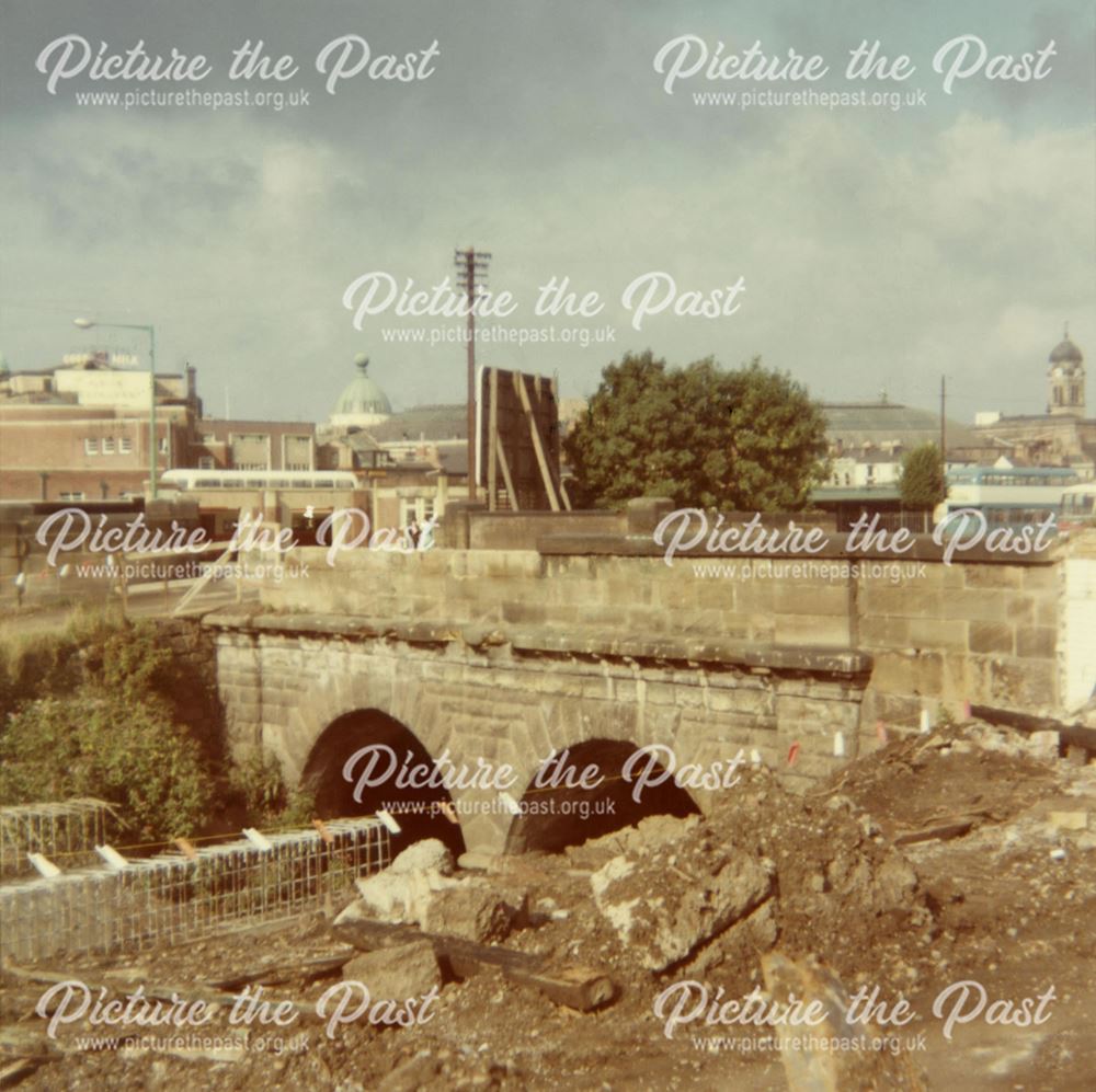 Stone Bridge over stream alongside Derby Canal