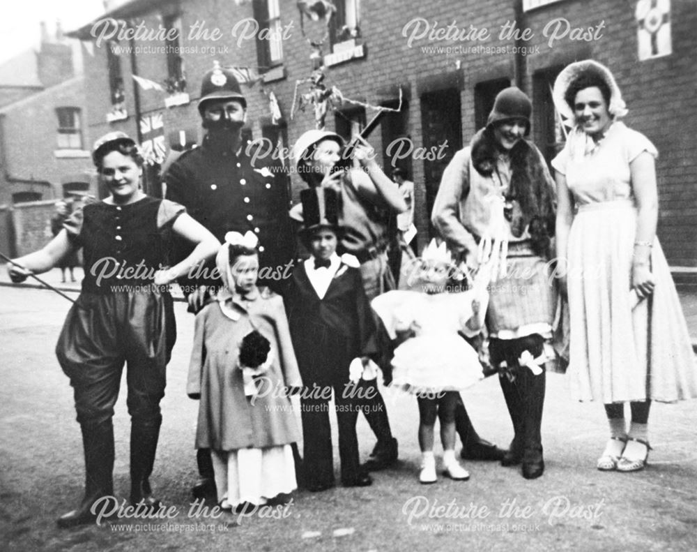 Coronation Street Party - Group photograph of inhabitants in fancy dress