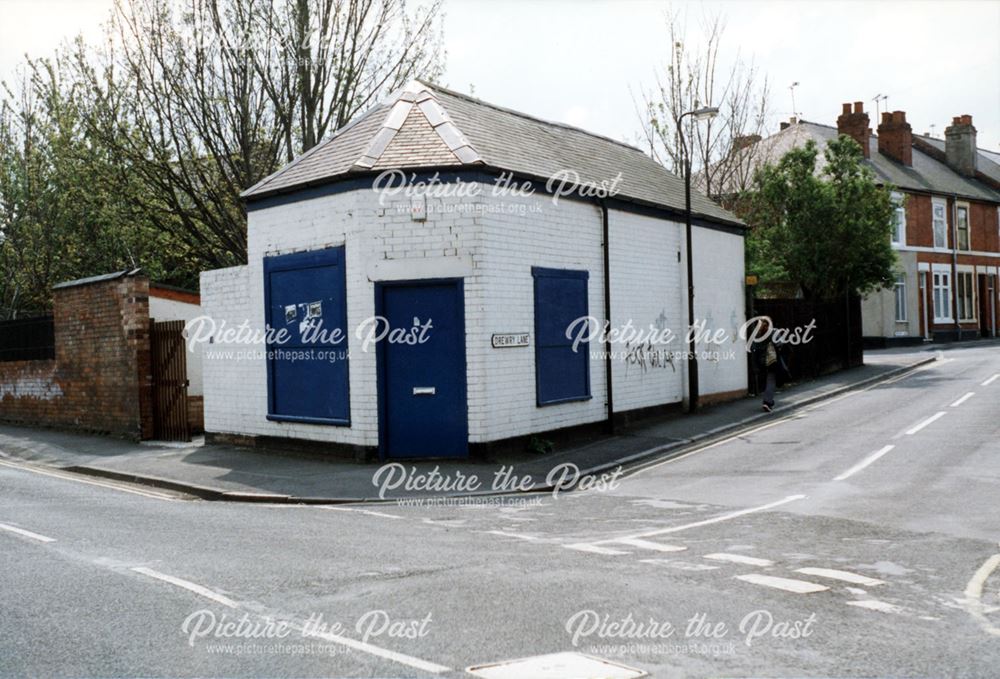 Boarded up shop and yard at the corner of Monk Street - Drewry Street