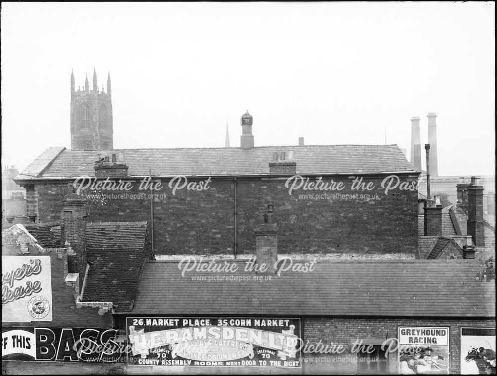 Rooftop view of the side of the Assembly Rooms and advertisements from Full Street-Derwent Street