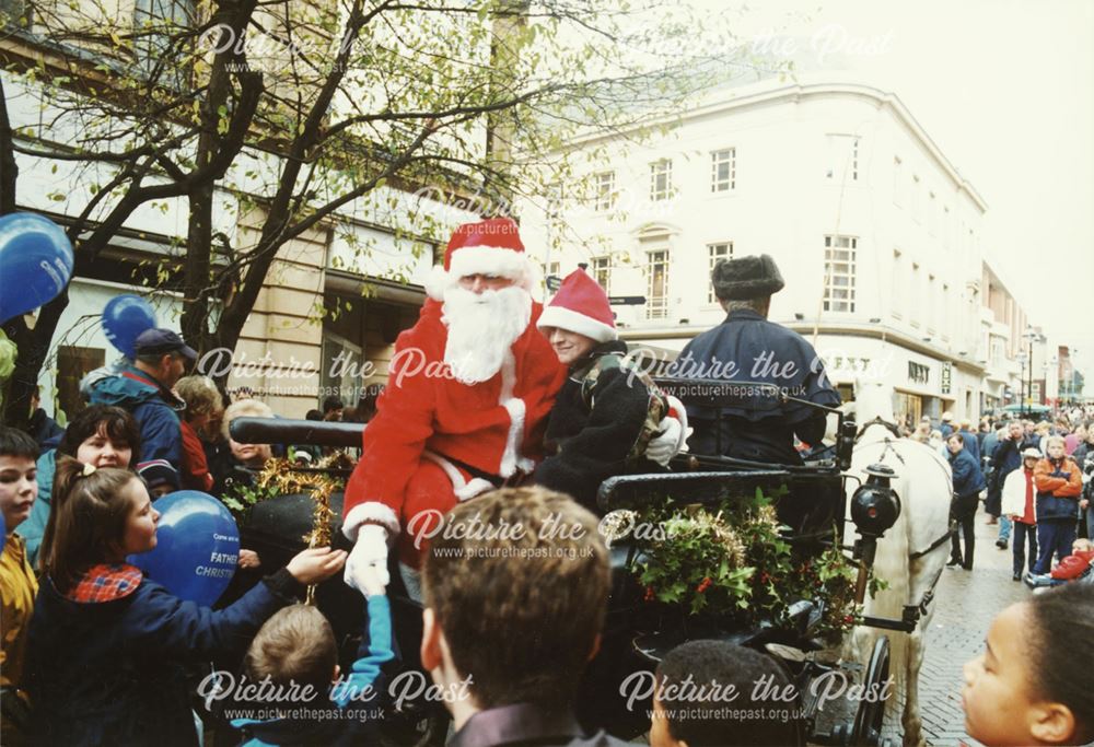 Father Christmas arriving in Exchange Street